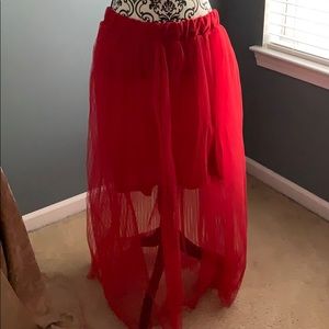 Long sheer red skirt with mini slip under